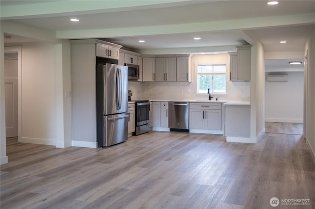 343 Hawkins Rd, Winlock, WA 98596 - kitchen featuring stainless steel appliances, light wood-style floors, light countertops, and recessed lighting