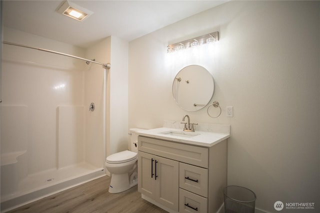343 Hawkins Rd, Winlock, WA 98596 - full bath featuring wood finished floors, a shower, toilet, and vanity
