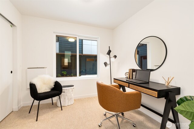office with carpet flooring and baseboards