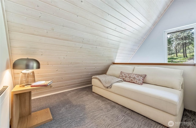981 Nighthawk Ridge Ln, Leavenworth, WA 98826 - sitting room featuring carpet, lofted ceiling, wooden ceiling, and wood walls