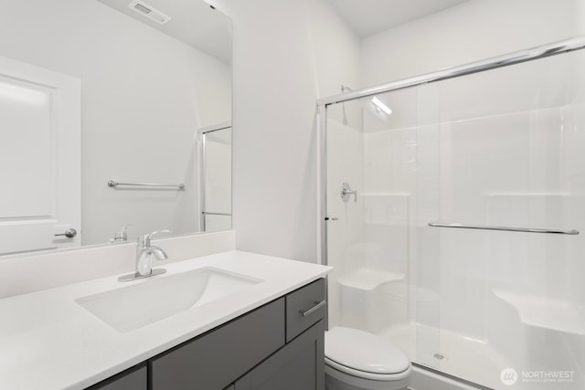 13302 SE 238th Pl Unit 7, Kent, WA 98042 - full bath featuring toilet, a stall shower, and vanity