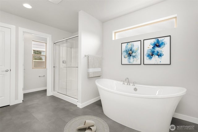 13302 SE 238th Pl Unit 7, Kent, WA 98042 - full bath featuring baseboards, a stall shower, plenty of natural light, a freestanding bath, and recessed lighting