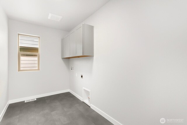 13302 SE 238th Pl Unit 7, Kent, WA 98042 - washroom with cabinet space, electric dryer hookup, baseboards, and washer hookup