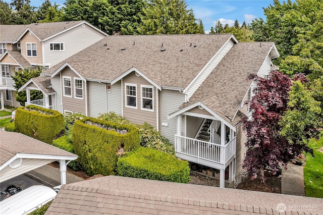 5400 Harbour Pointe Blvd Unit F202, Mukilteo, WA 98275 - rear view of house featuring roof with shingles