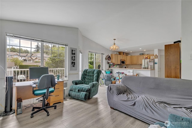 5400 Harbour Pointe Blvd Unit F202, Mukilteo, WA 98275 - living area featuring vaulted ceiling, light wood-style flooring, an office area, and recessed lighting