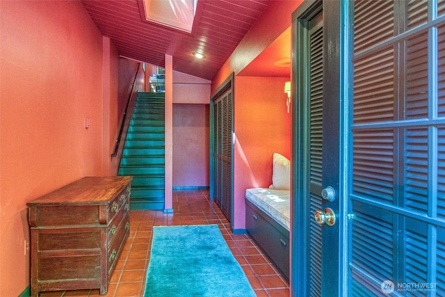 1472 White Beach Rd, Orcas Island, WA 98280 - stairs with vaulted ceiling, tile patterned floors, and wooden ceiling