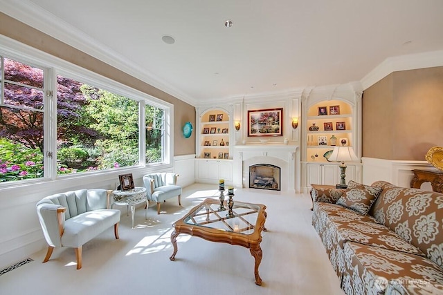 11211 Wachusett Rd, Woodway, WA 98020 - carpeted living room with built in features, a fireplace, and ornamental molding