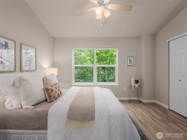 3116 164th St SW Unit 1804, Lynnwood, WA 98087 - bedroom featuring wood finished floors, baseboards, and ceiling fan