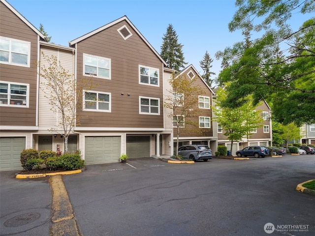 3116 164th St SW Unit 1804, Lynnwood, WA 98087 - view of property with an attached garage