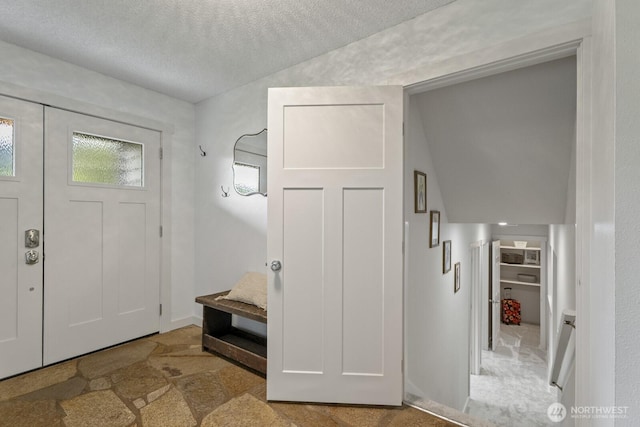436 SE Maple Dr, North Bend, WA 98045 - entryway with a textured ceiling