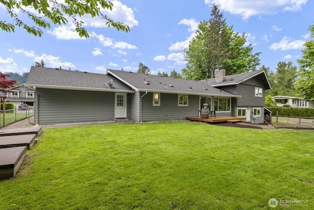 436 SE Maple Dr, North Bend, WA 98045 - back of house featuring a wooden deck and a chimney