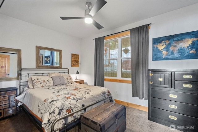 bedroom featuring carpet flooring, baseboards, and ceiling fan