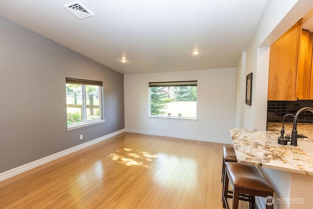 189 Hill Rd, Walla Walla, WA 99362 - living area with baseboards, light wood-style flooring, recessed lighting, and lofted ceiling