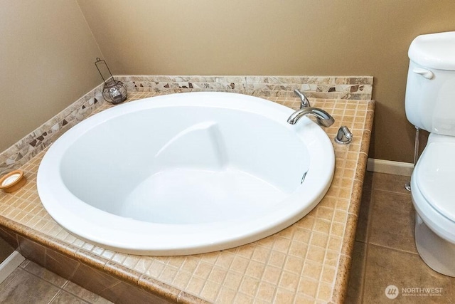 189 Hill Rd, Walla Walla, WA 99362 - bathroom with toilet, tile patterned flooring, and a bath