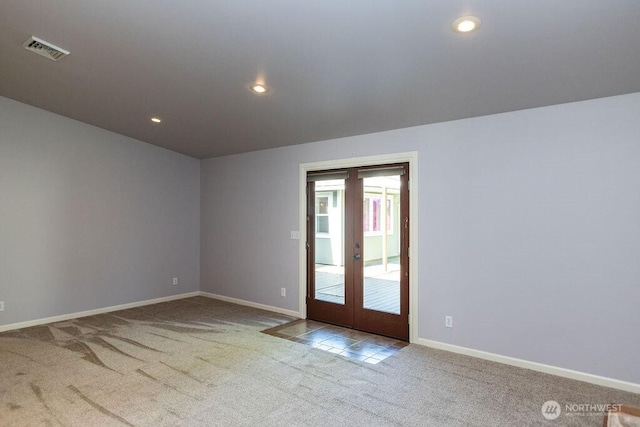 189 Hill Rd, Walla Walla, WA 99362 - carpeted empty room featuring french doors, baseboards, and recessed lighting