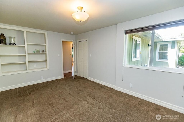 189 Hill Rd, Walla Walla, WA 99362 - carpeted empty room with baseboards and built in features