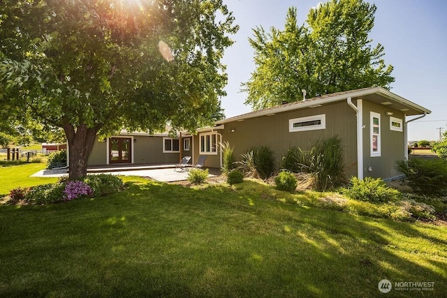 189 Hill Rd, Walla Walla, WA 99362 - back of property with a yard, a patio, and french doors