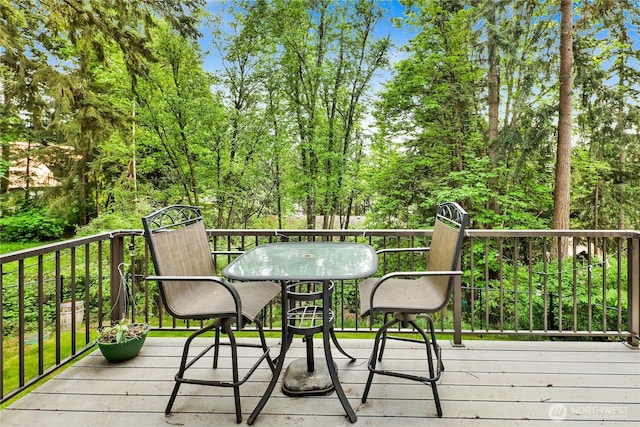 deck featuring outdoor dining space