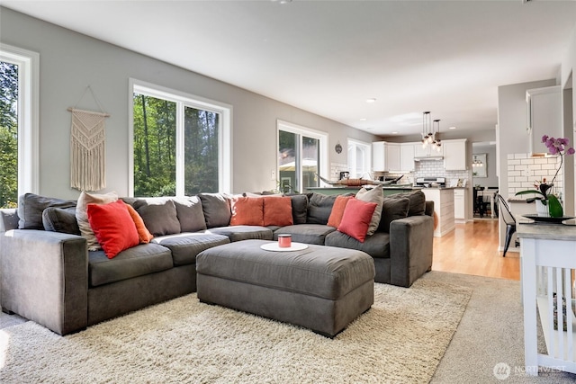 20121 3rd Ave NW, Arlington, WA 98223 - living room featuring recessed lighting, light carpet, and light wood-style flooring