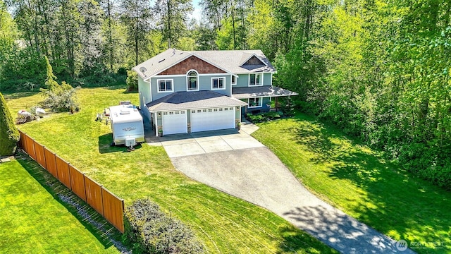 20121 3rd Ave NW, Arlington, WA 98223 - view of front of house featuring driveway and an attached garage