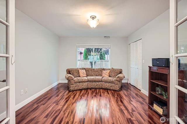 19702 99th Ct E, Bonney Lake, WA 98391 - living room featuring wood finished floors and baseboards