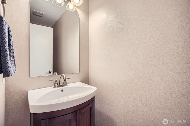 19702 99th Ct E, Bonney Lake, WA 98391 - bathroom with vanity and a textured wall