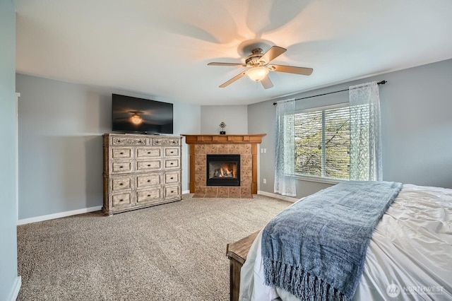 19702 99th Ct E, Bonney Lake, WA 98391 - carpeted bedroom featuring a fireplace, baseboards, and a ceiling fan