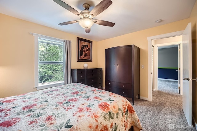 19702 99th Ct E, Bonney Lake, WA 98391 - carpeted bedroom with a ceiling fan and baseboards