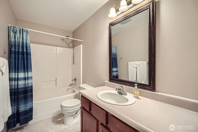 19702 99th Ct E, Bonney Lake, WA 98391 - bathroom featuring vanity, shower / bathtub combination with curtain, toilet, and tile patterned floors