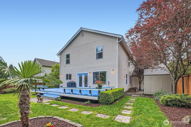 19702 99th Ct E, Bonney Lake, WA 98391 - rear view of house with french doors and a deck