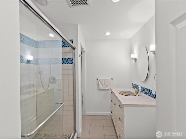 12513 NE 130th Way Unit C102, Kirkland, WA 98034 - full bath with tile patterned flooring, a stall shower, vanity, and recessed lighting