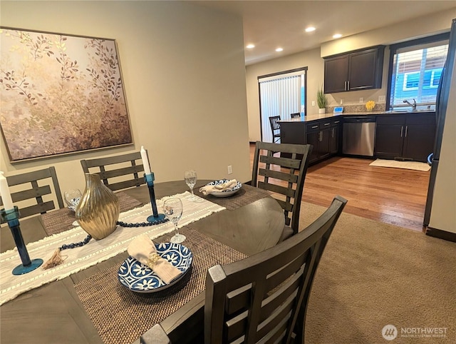3447 Barry Pl, Mount Vernon, WA 98274 - dining area featuring recessed lighting, light wood finished floors, bar with sink, and light carpet