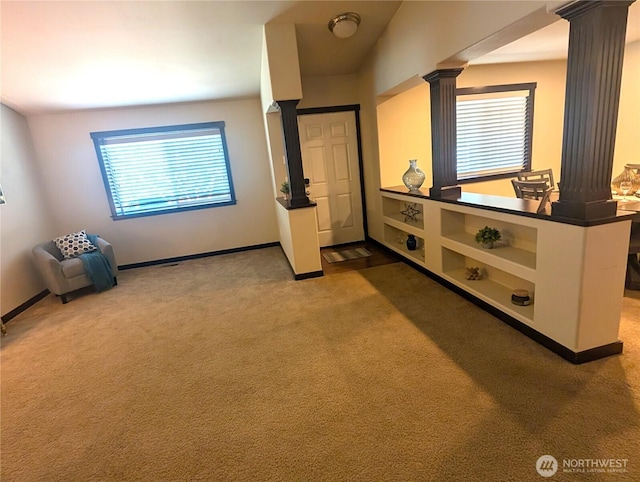3447 Barry Pl, Mount Vernon, WA 98274 - foyer featuring ornate columns, carpet flooring, and baseboards
