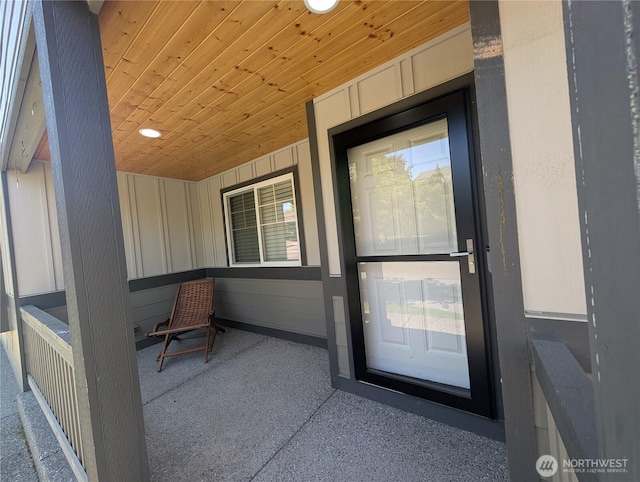 3447 Barry Pl, Mount Vernon, WA 98274 - doorway to property featuring board and batten siding and covered porch
