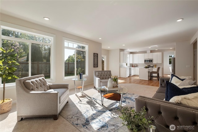 15704 124th Ave NE, Woodinville, WA 98072 - living area with recessed lighting and light wood-type flooring