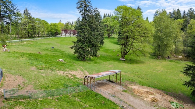 21803 NE Abernathy Rd, Yacolt, WA 98675 - surrounding community with a detached carport, a view of rural / pastoral area, driveway, and fence