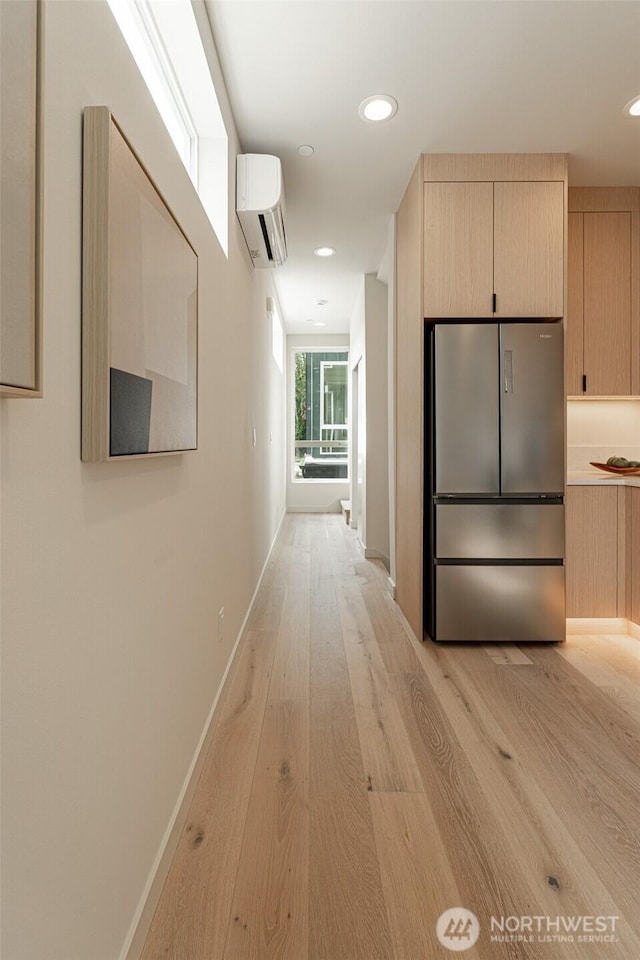 2108 15th Ave S Unit C, Seattle, WA 98144 - hall featuring a wall mounted air conditioner, light wood-style flooring, recessed lighting, and baseboards
