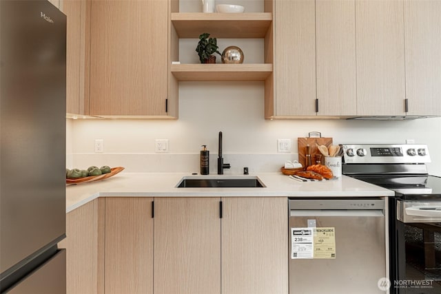 2108 15th Ave S Unit C, Seattle, WA 98144 - kitchen with appliances with stainless steel finishes, a sink, light brown cabinetry, and light countertops