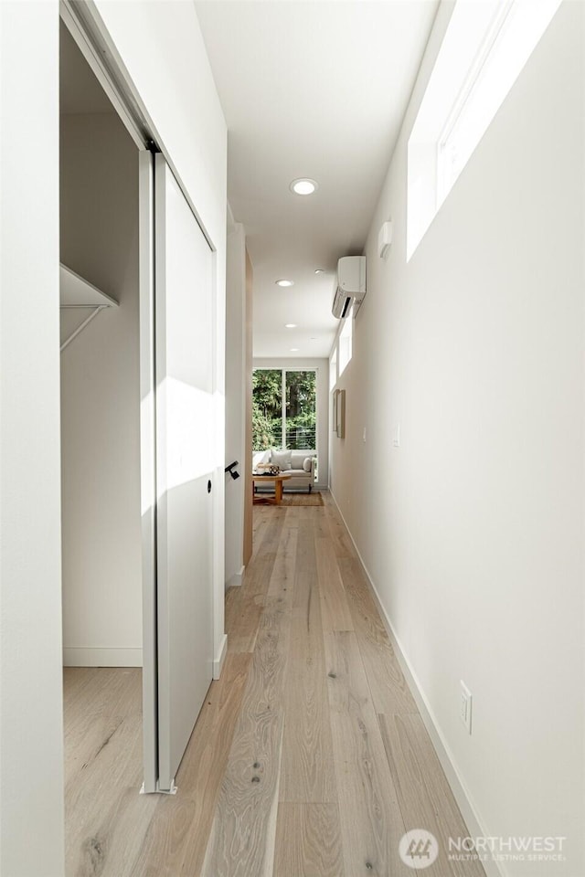 2108 15th Ave S Unit C, Seattle, WA 98144 - corridor featuring a wall mounted air conditioner, light wood finished floors, recessed lighting, and baseboards