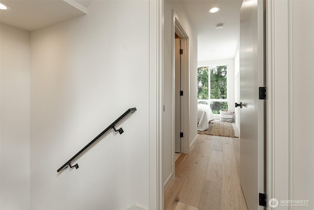 2108 15th Ave S Unit C, Seattle, WA 98144 - hallway with an upstairs landing, light wood finished floors, and recessed lighting