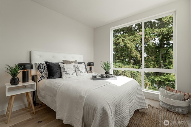 2108 15th Ave S Unit C, Seattle, WA 98144 - bedroom with wood finished floors and multiple windows