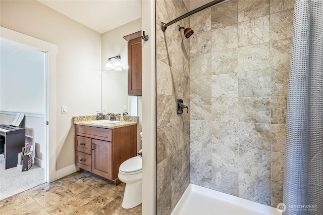 411 19th St NE Unit 9, East Wenatchee, WA 98802 - bathroom with vanity, a stall shower, and toilet