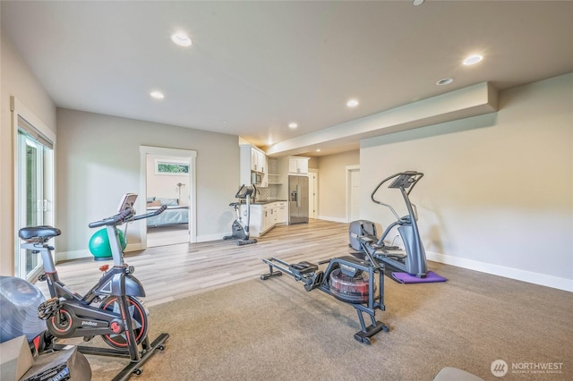411 19th St NE Unit 9, East Wenatchee, WA 98802 - exercise room with recessed lighting, baseboards, and light wood-style floors