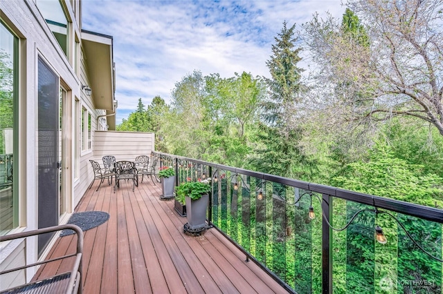 411 19th St NE Unit 9, East Wenatchee, WA 98802 - wooden terrace with outdoor dining area