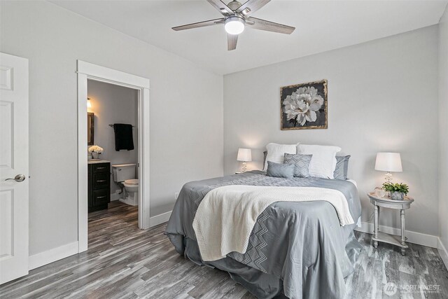bedroom featuring wood finished floors, baseboards, connected bathroom, and ceiling fan