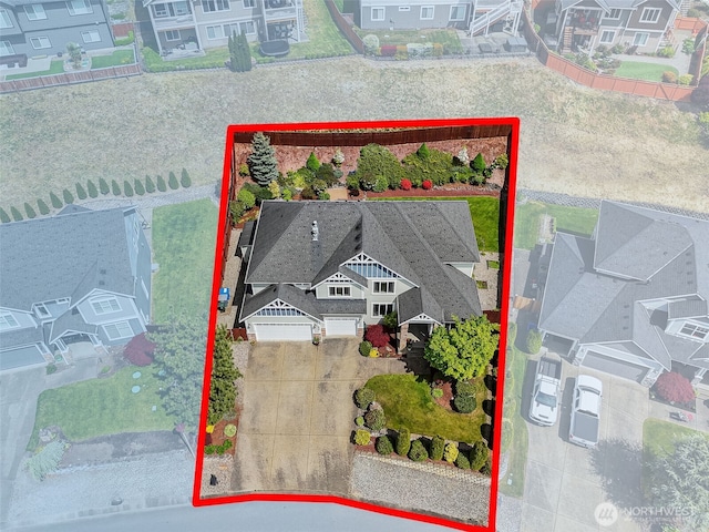 aerial perspective of suburban area featuring property boundaries highlighted