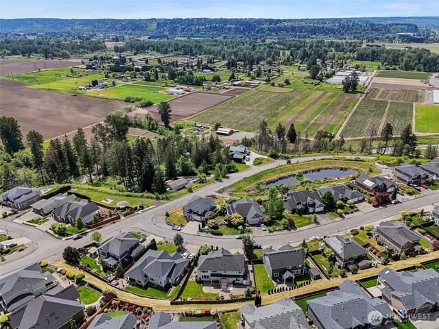 aerial view of property's location featuring nearby suburban area