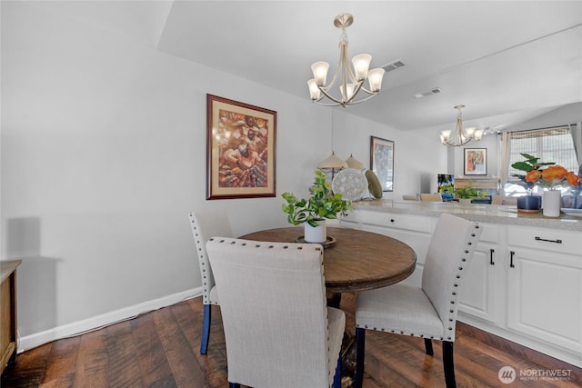 dining area with a chandelier, dark wood-style flooring, and baseboards