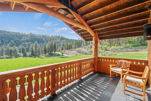 111 Connon Canyon Rd, Leavenworth, WA 98826 - view of wooden balcony featuring a wooded view and a deck