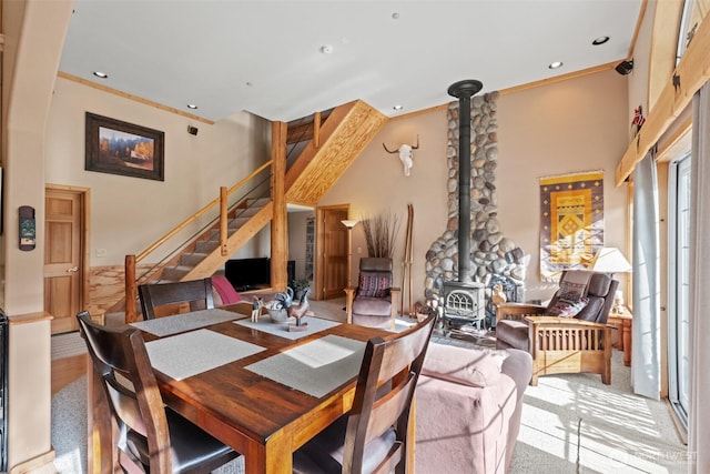111 Connon Canyon Rd, Leavenworth, WA 98826 - dining room with a wood stove, stairway, recessed lighting, and crown molding